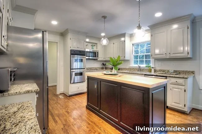 kitchen staged to sell by removing items on counters and refrigerator