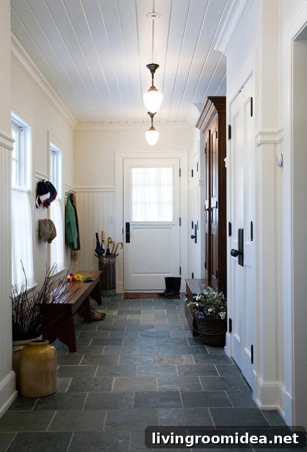 Hallway Entryway -White Paneled Walls and Gray Tile Floor