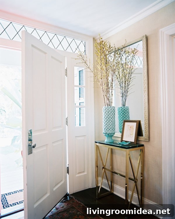 Grasscloth wallpaper in the entry