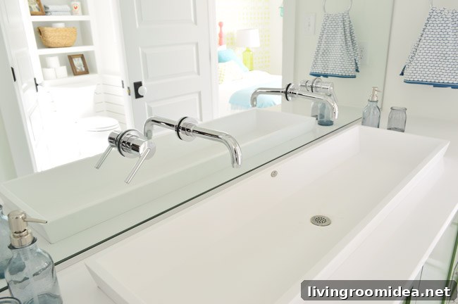 Showhouse bathroom with private toilet behind a door
