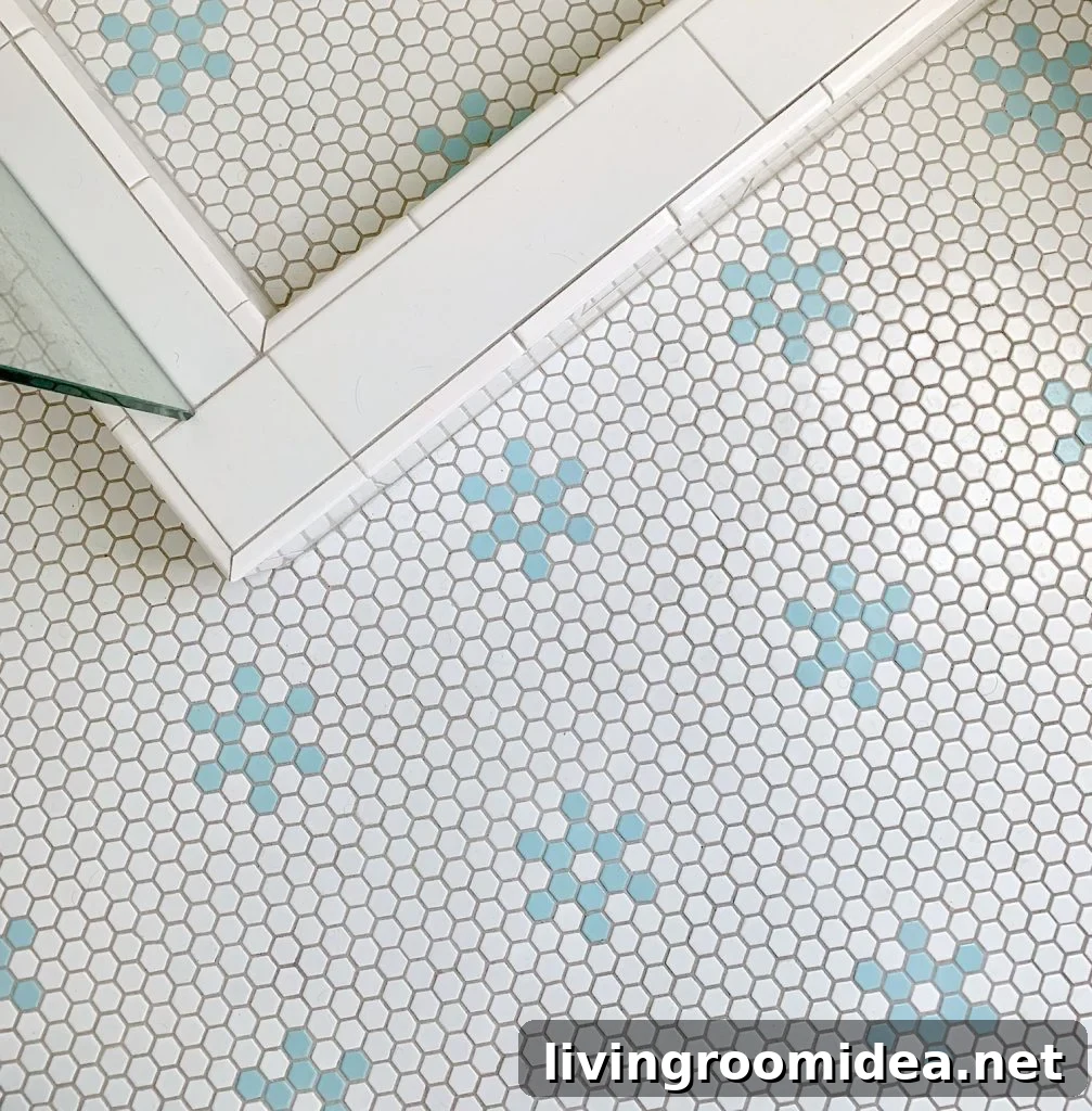 Hex tile bathroom floor with aqua blue flower shapes
