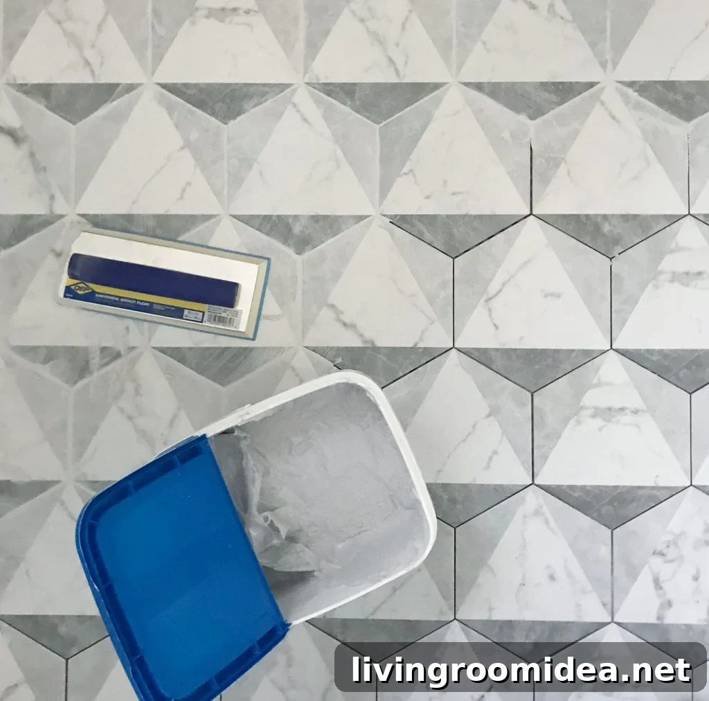marble hex tiles getting grouted with mapei grout
