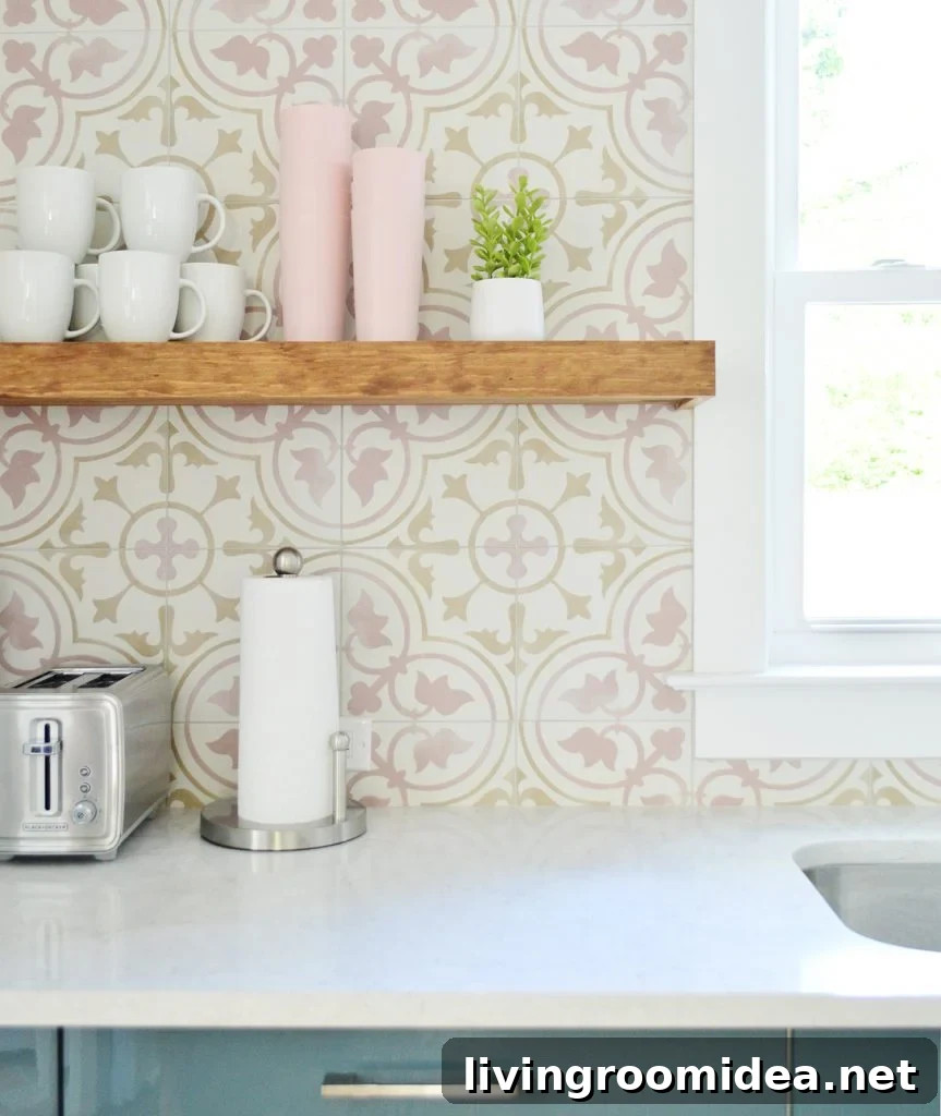 Wood Floating Kitchen Shelf Against Pink Patterned Tile Backsplash
