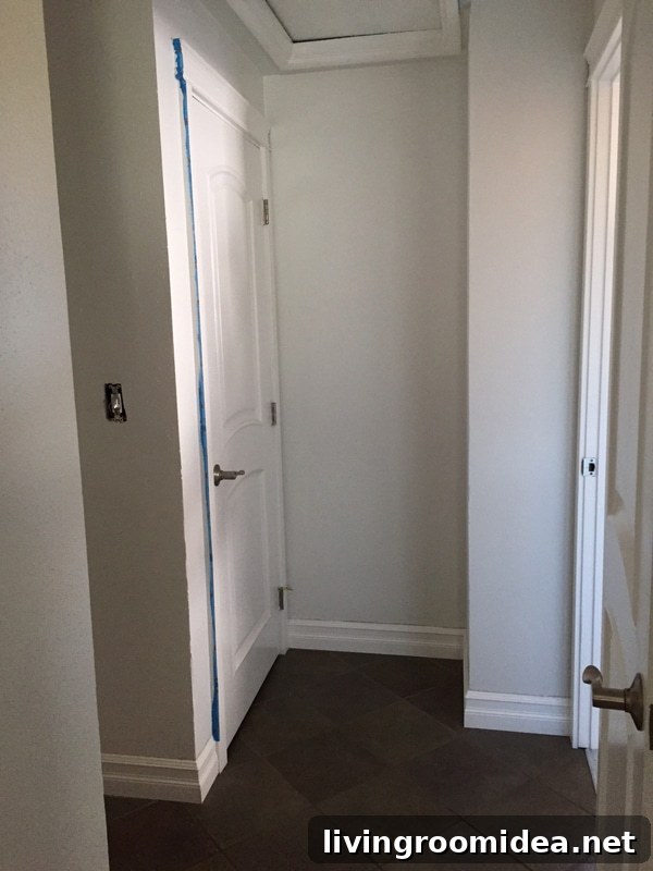 Hallway-Progress-White-Paint-and-Slate-Floors