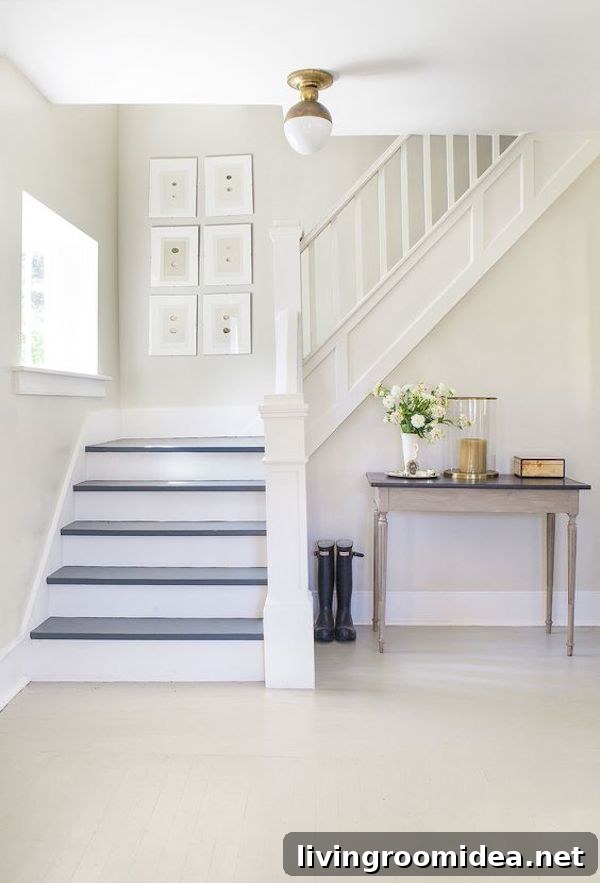 Whitewashed Entry - Gray and White Staircase in A House in the Hamptons - Lonny Mag