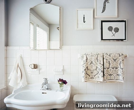 Soft & Subtle Color Palette Ideas for Calm, Stylish Spaces 4 Pretty Bathroom - Pale Blue White and Black - Lonny