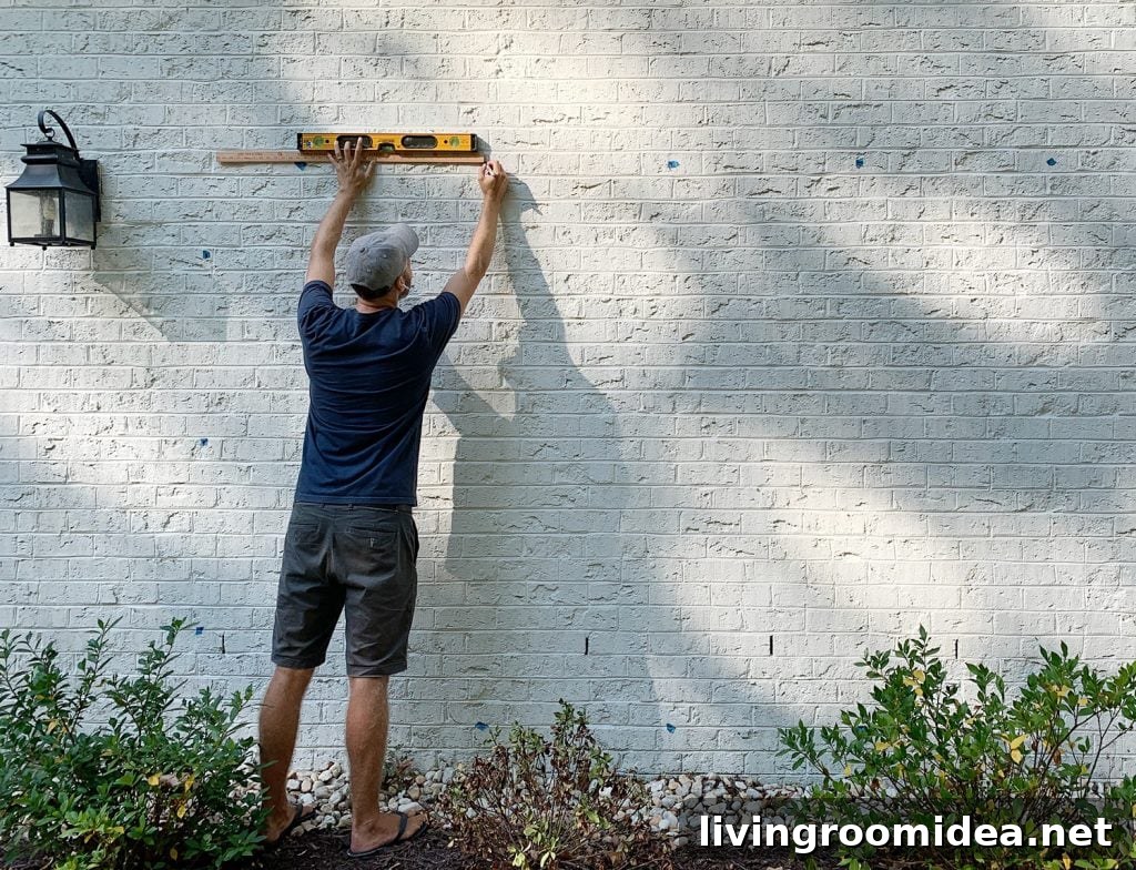 John Marking Trellis Hooks On Brick Wall