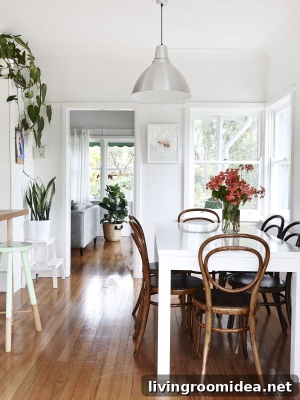 White dining room by Amber Creswell Bell