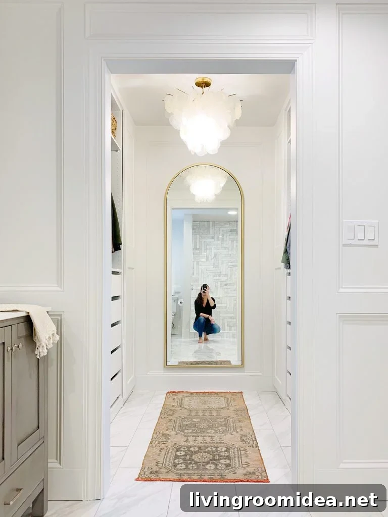 IKEA PAX Closet Makeover: Budget Breakdown + Video Tour 4 Sherry Selfie In Arched Brass Mirror In Master Closet