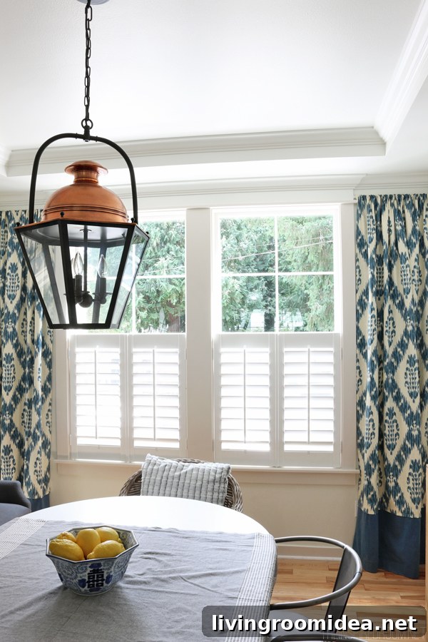 The Inspired Room Dining Room - Copper Lantern Plantation Shutters and Ikat Curtains