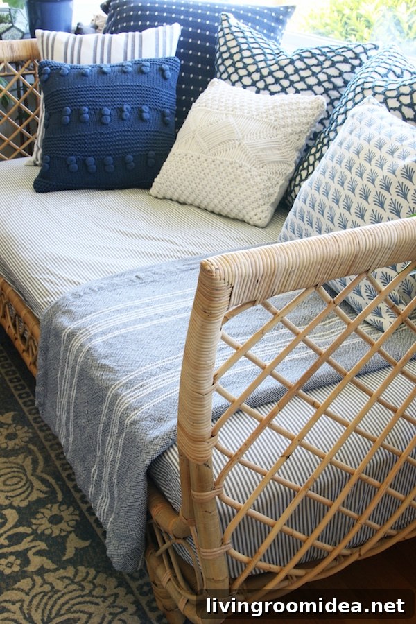 Rattan Daybed: Cozy Window Corner for Relaxing Views 7 Blue and White Pillows - Rattan Daybed