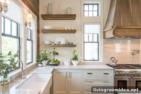 White Kitchen with Wood Floating Shelves and Wood Range Hood - Old Seagrove Homes