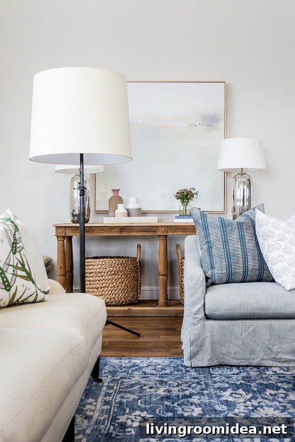 Blue Patterned Statement Rugs: Inspired Designs for Bold Spaces 5 Studio McGee - Blue and White Patterned Rug and Slipcovered Sofa - Foothill Drive Project