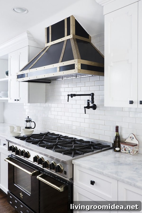 White Kitchen with Black Hardware and Black and Brass Range Hood