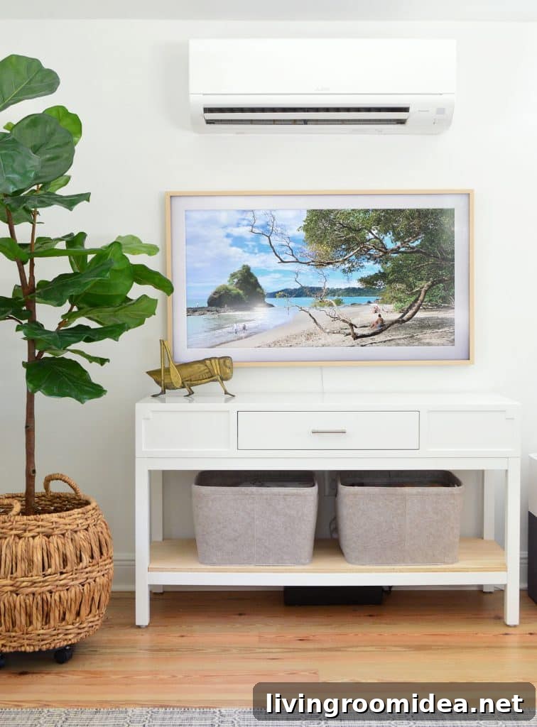 How Buying Less Leads to Unexpectedly Funny Benefits 3 Samsung Frame TV with faux fig tree