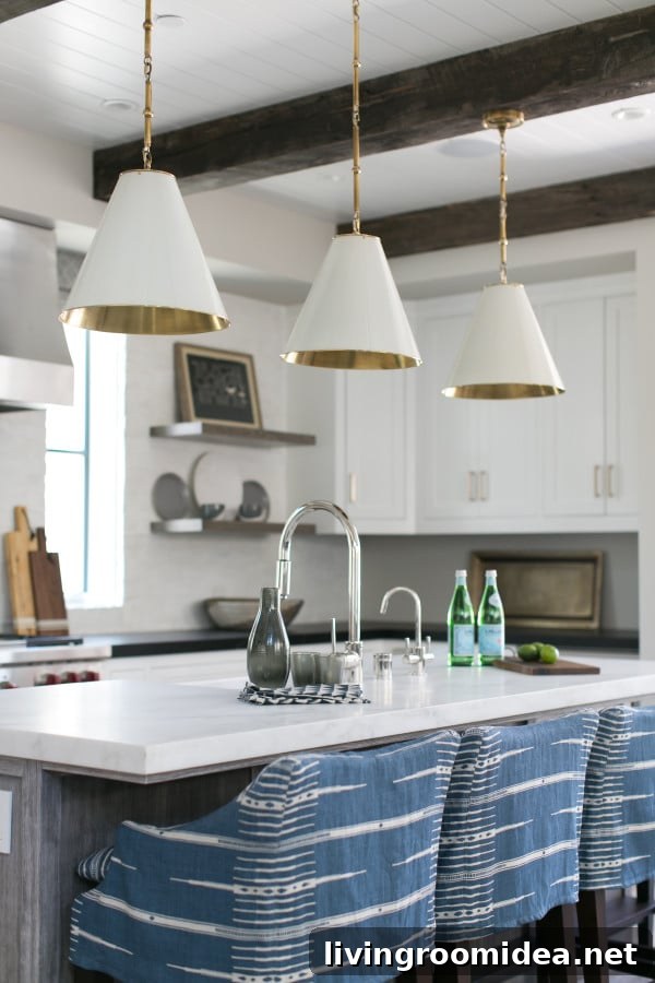 8 Showstopping Kitchen Design Ideas to Transform Your Space 8 Kitchen Ideas Beautiful White Kitchen by Brooke Wagner - Wood Beams and Statement Lighting - Click through for 8 showstopping elements for a kitchen design!