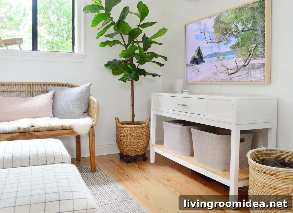 White Media Console With Frame TV And Woven Accessories