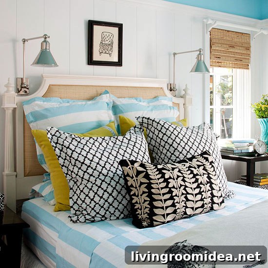 Wall sconces and art over the bed - Bedroom decor ideas