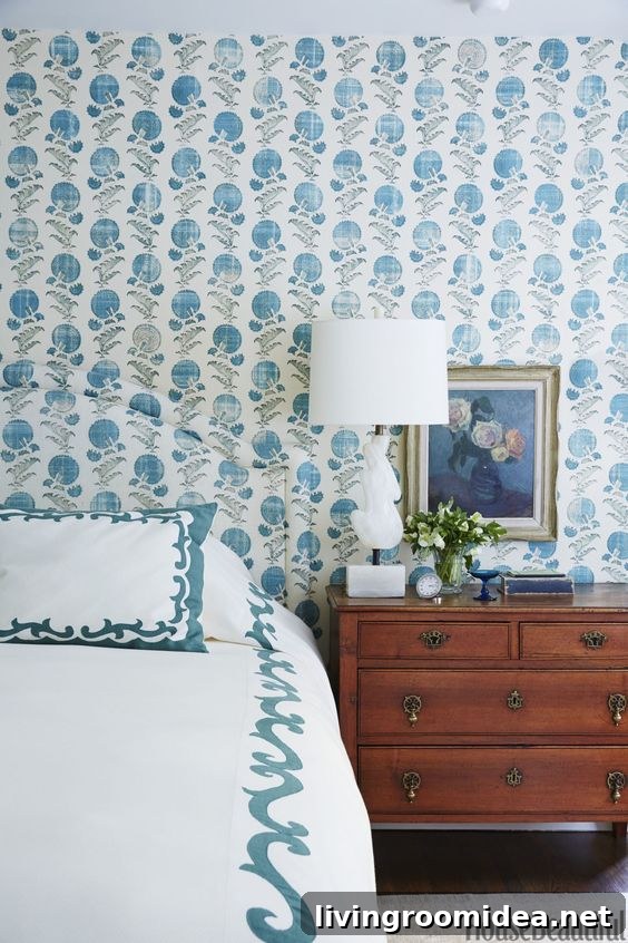 Beautiful bedroom with blue floral wallpaper. Click through for more bedroom wallpaper ideas!