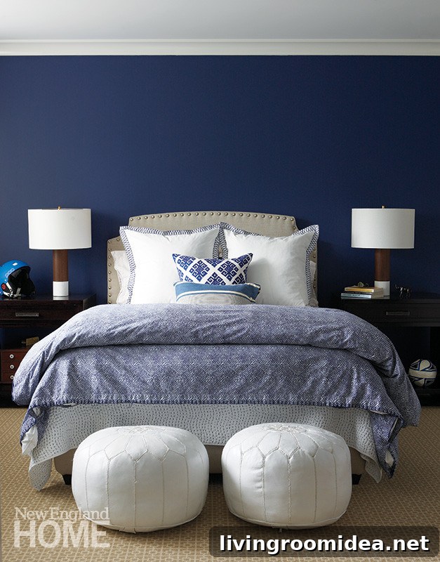What to Place at the Foot of Your Bed: Stylish Ideas and Tips 3 Navy blue bedroom - two poufs at the end of the bed - Click through for ideas for what to put at the end of the bed!