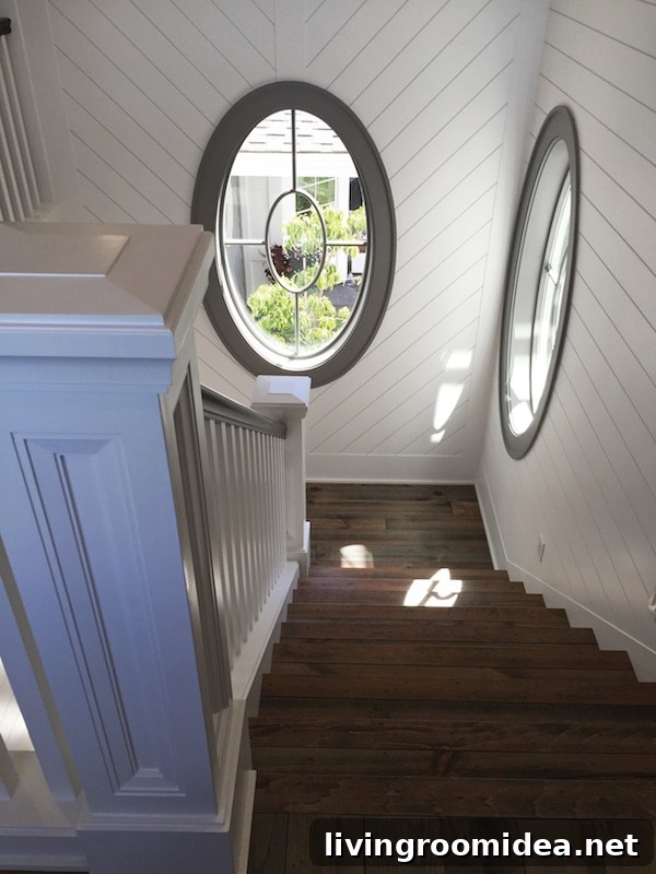 Click through to take a tour of this GORGEOUS farmhouse style house - Shiplap and Oval Windows in the Staircase