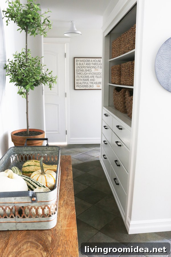 Click through to see a fall house tour of this small white brick cottage with eclectic coastal farmhouse style. 