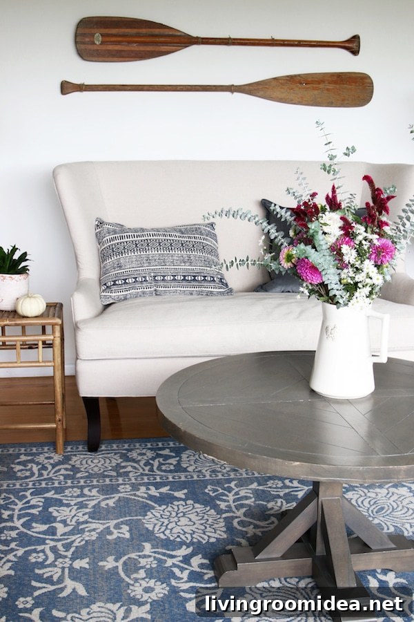 Click through to see a fall house tour of this small white brick cottage with eclectic coastal farmhouse style. 