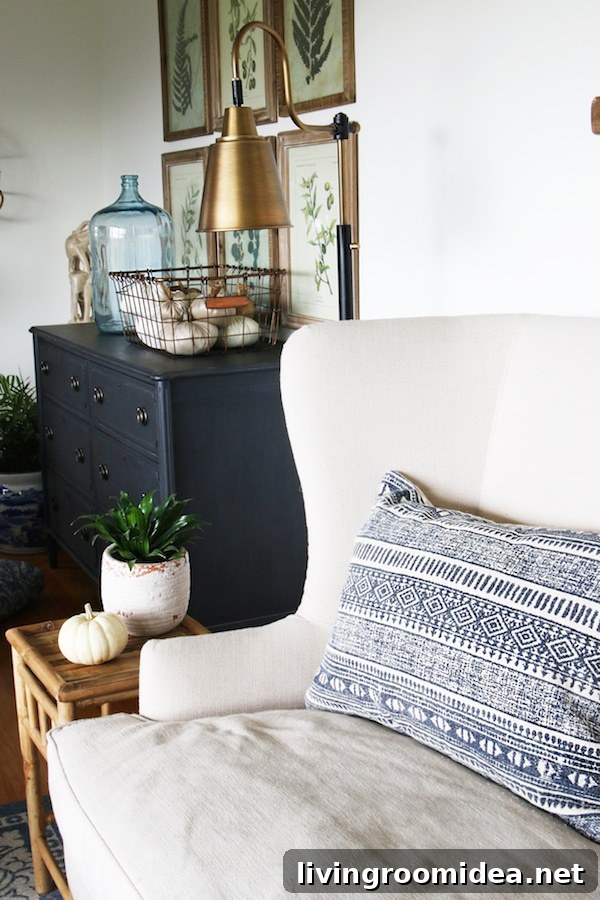 Click through to see a fall house tour of this small white brick cottage with eclectic coastal farmhouse style. 