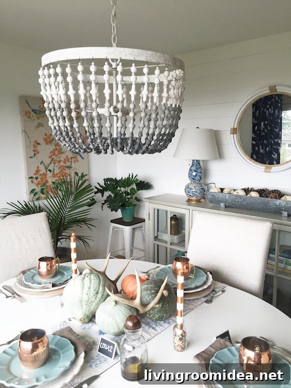 Click through to see a fall house tour of this small white brick cottage with eclectic coastal farmhouse style. 