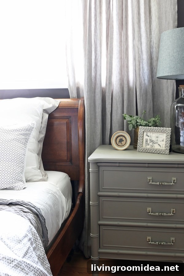 Dark plum walls in cozy small bedroom! Sources, bedding and details are in the post.
