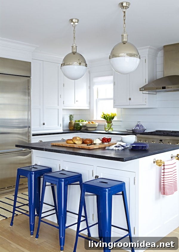White shiplap kitchen with navy stools from Chango and Co.