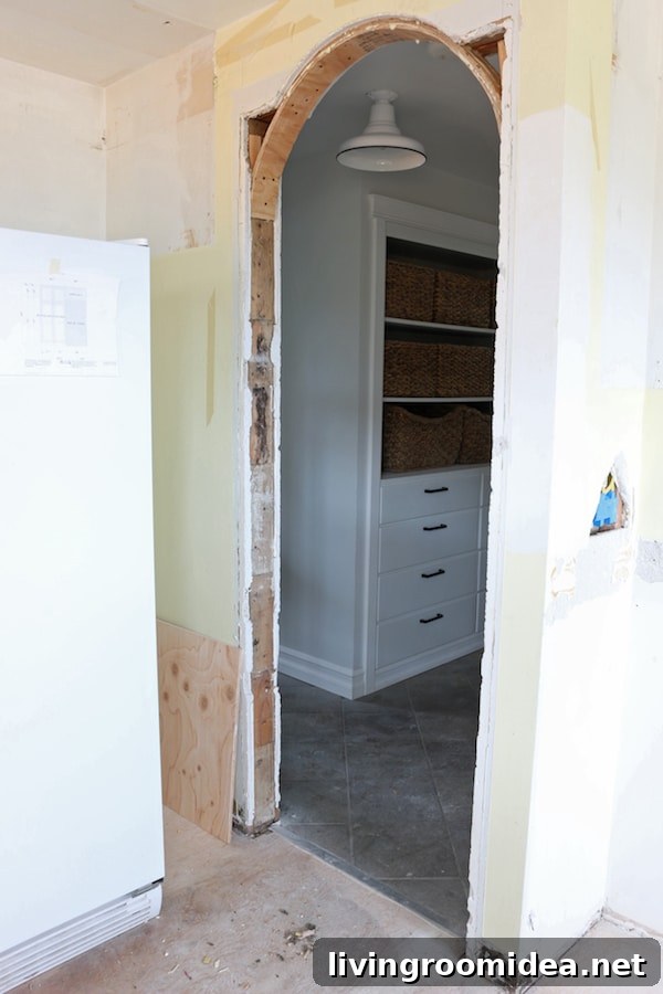 Kitchen Remodel Progress Update: Before, During, and After Photos 7 archway-into-hall