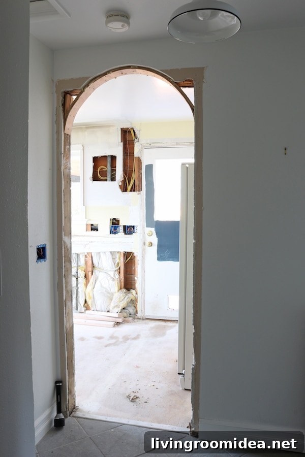 Kitchen Remodel Progress Update: Before, During, and After Photos 8 hallway-with-arch